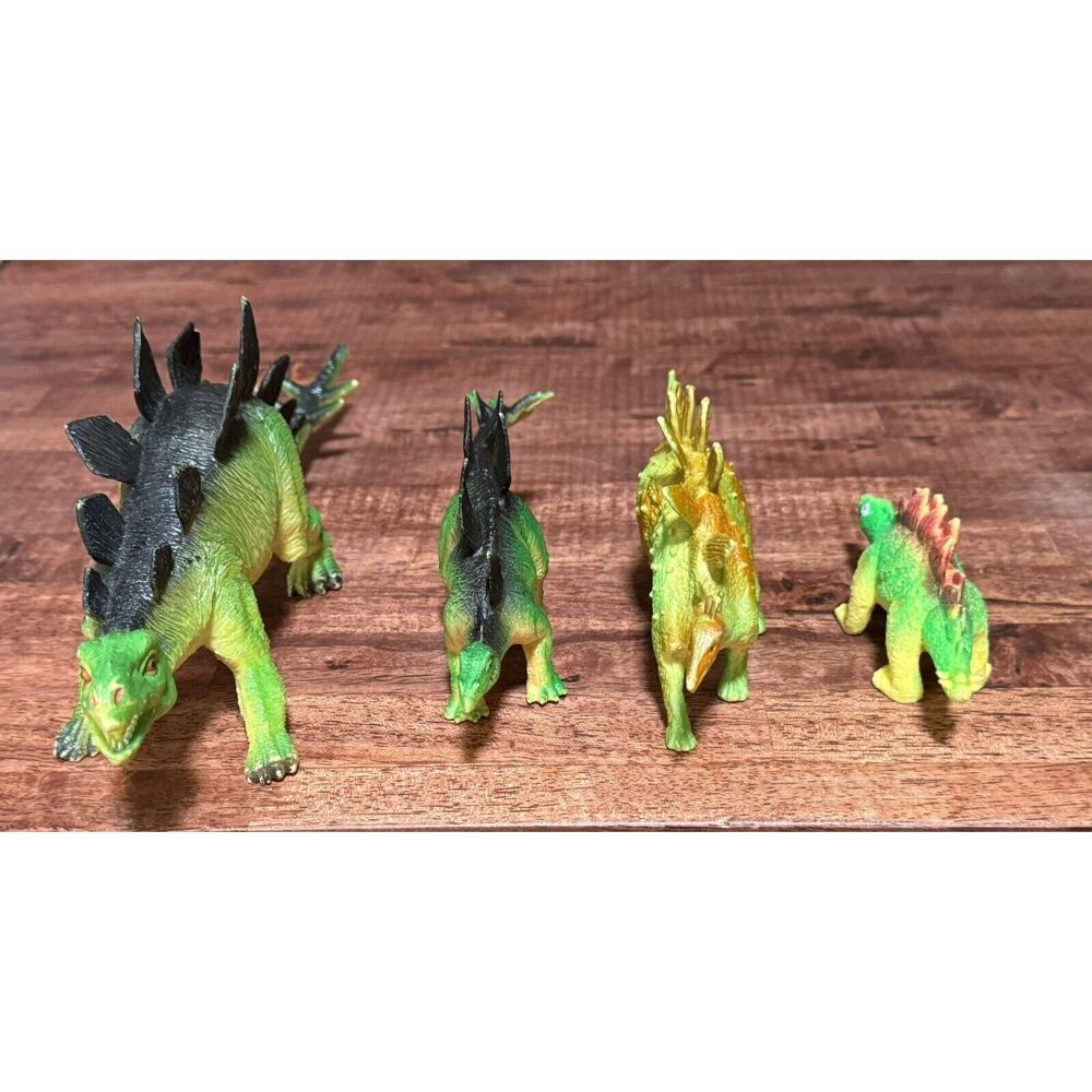Four STEGOSAURUS Dinosaur Toys
